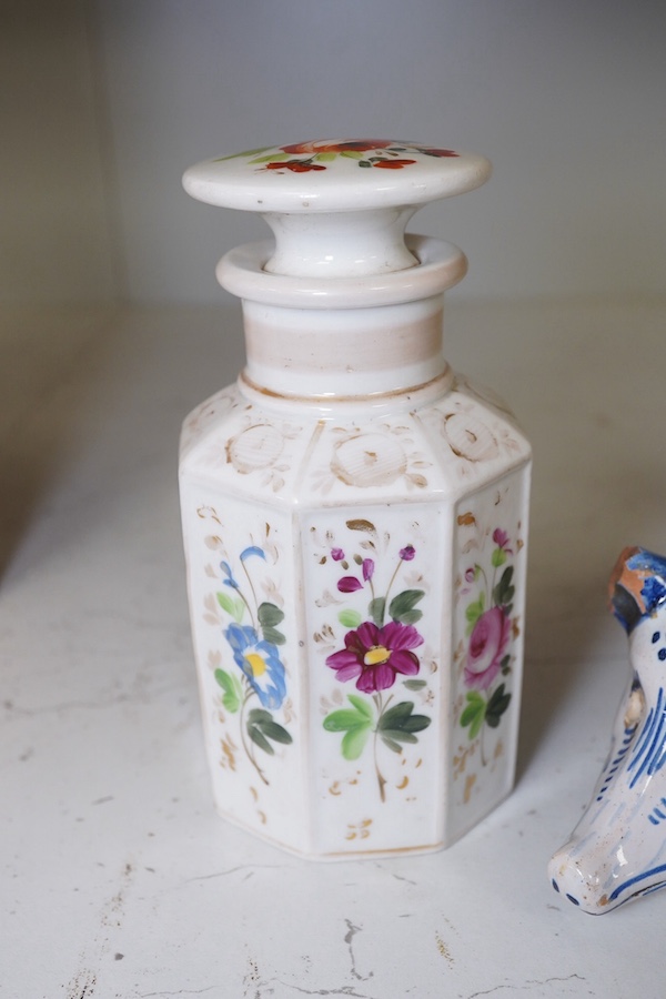 A faience ‘pig’ money bank, and two early 19th century painted lidded jars. Condition - poor, damage to pig.